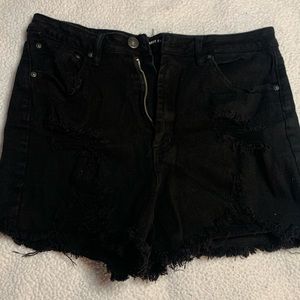 Almost famous black juniors jean short ripped